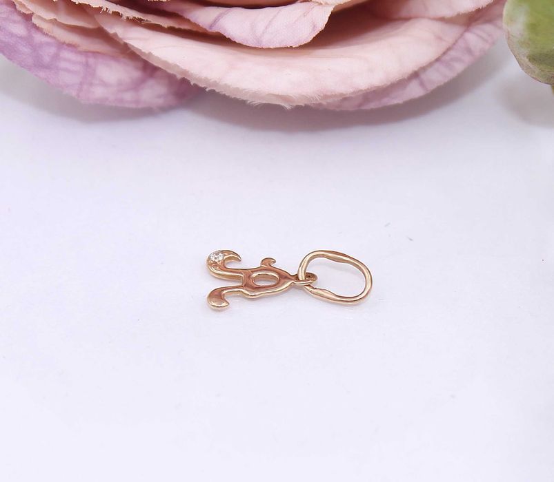 Złota zawieszka p.585/0,41g - literka "A" z cyrkonią