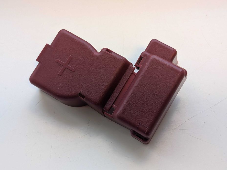 Захисна кришка на плюсовий контакт акумулятора 24345-7992A 2434579912