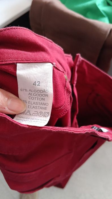 Calças novas, preço unitário