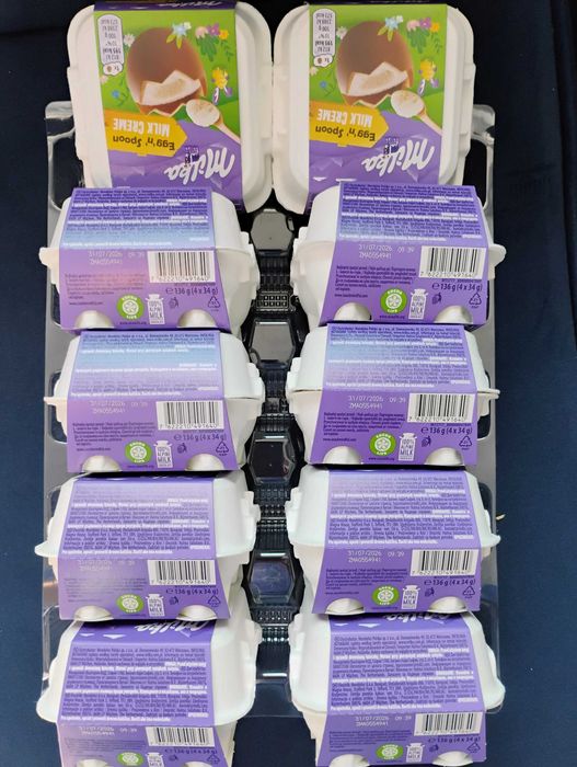 Milka 40 czekoladowych jajek Milka z kremem w środku,1 opakowanie -136g  z 10 opakowań