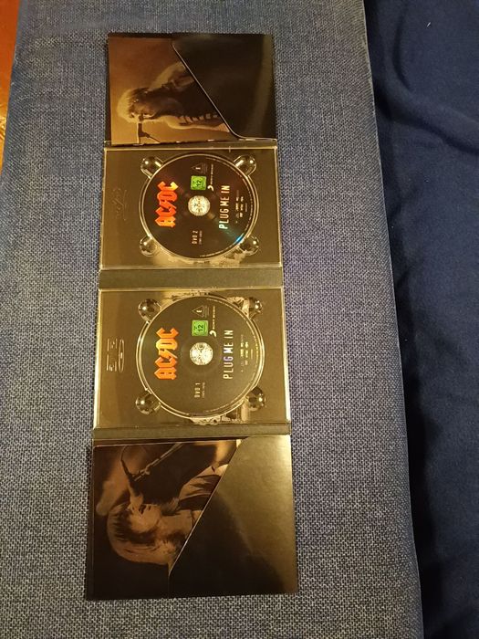 AC/DC - Plug Me In, 2 DVDs (free shipping)64297541046787124