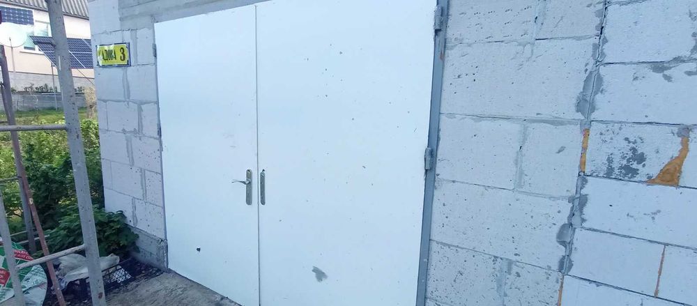 Гаражні двері металеві з коробкою