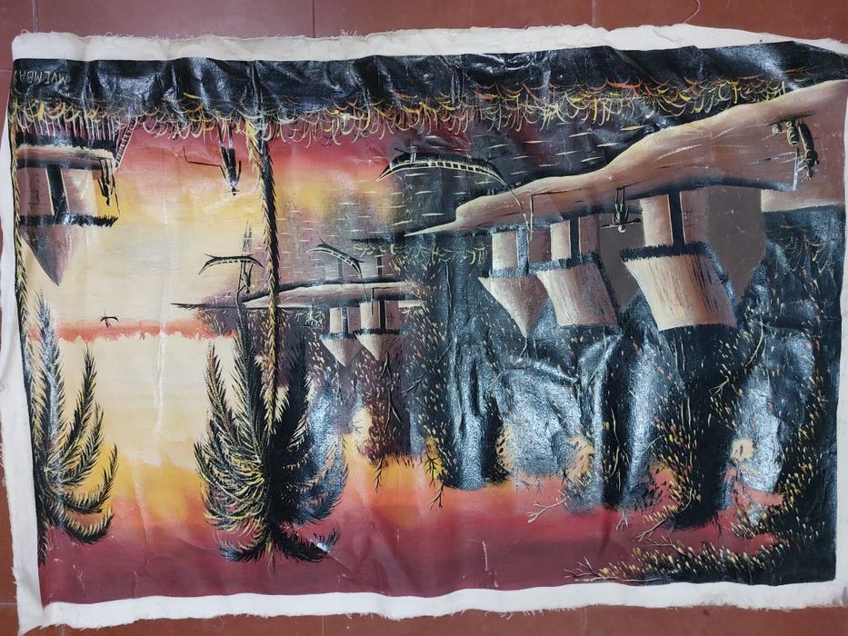Telas pintadas à mão por artista africano