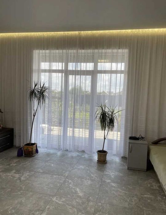 Будинок з ремонтом 92 кв.м., три кімнати, ділянка 6,5 соток, тераса