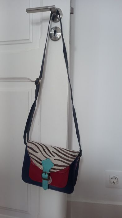 Mala em pele, artesanal