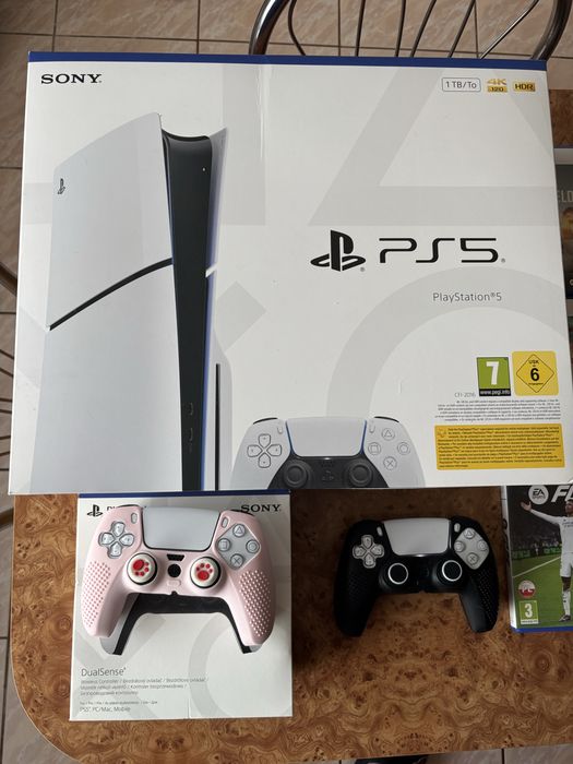 Ps5 chassis 1tb + 2 pady + 9 gier Poraj • OLX.pl