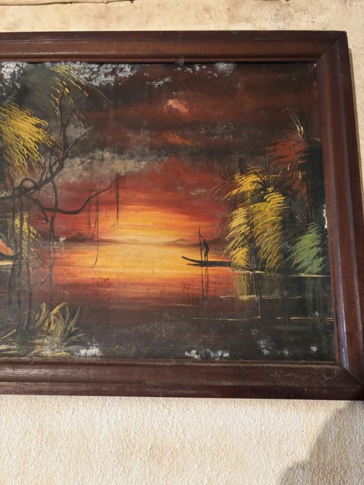 Quadro decorativo com uma pintura de uma paisagem tropical ao pôr do sol, semelhante a obras de arte de ilhas tropicais com palmeiras e barcos