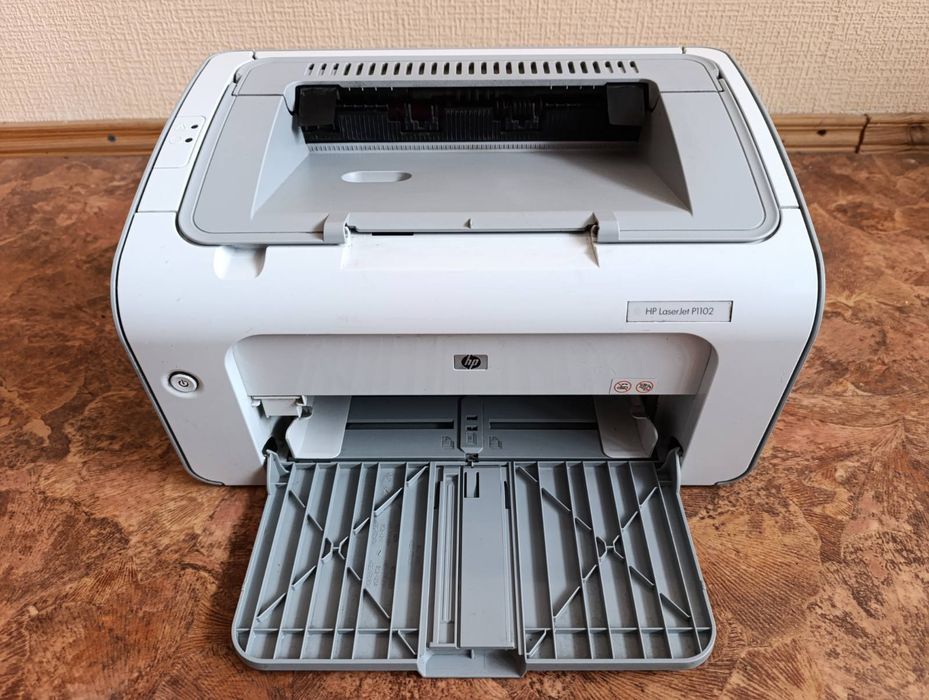 Принтер HP P1102