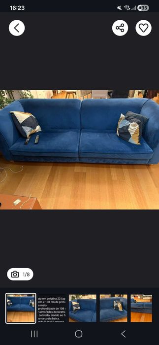 Sofa azul com pouco uso.