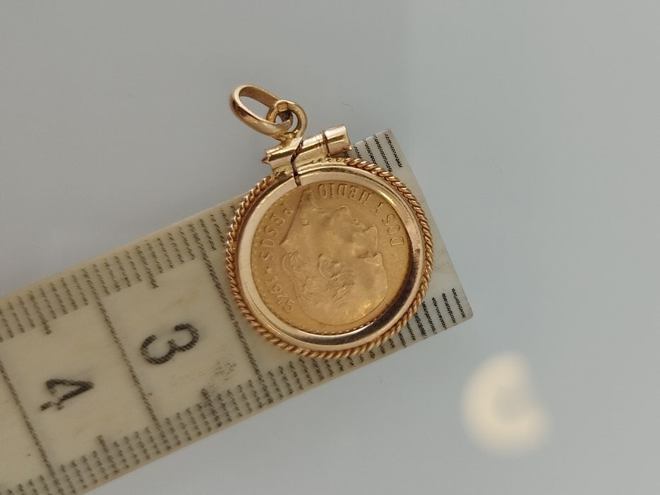 Moeda 2,5 pesos mexicanos de toque 900 com aro de 19,2kt