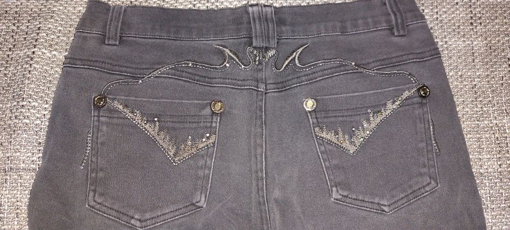 2 pary spodni Jeans białe i czarne rozmiar 158 cm 95% bawełna