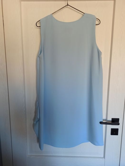Błękitna sukienka Stone Skirts r. 40 L