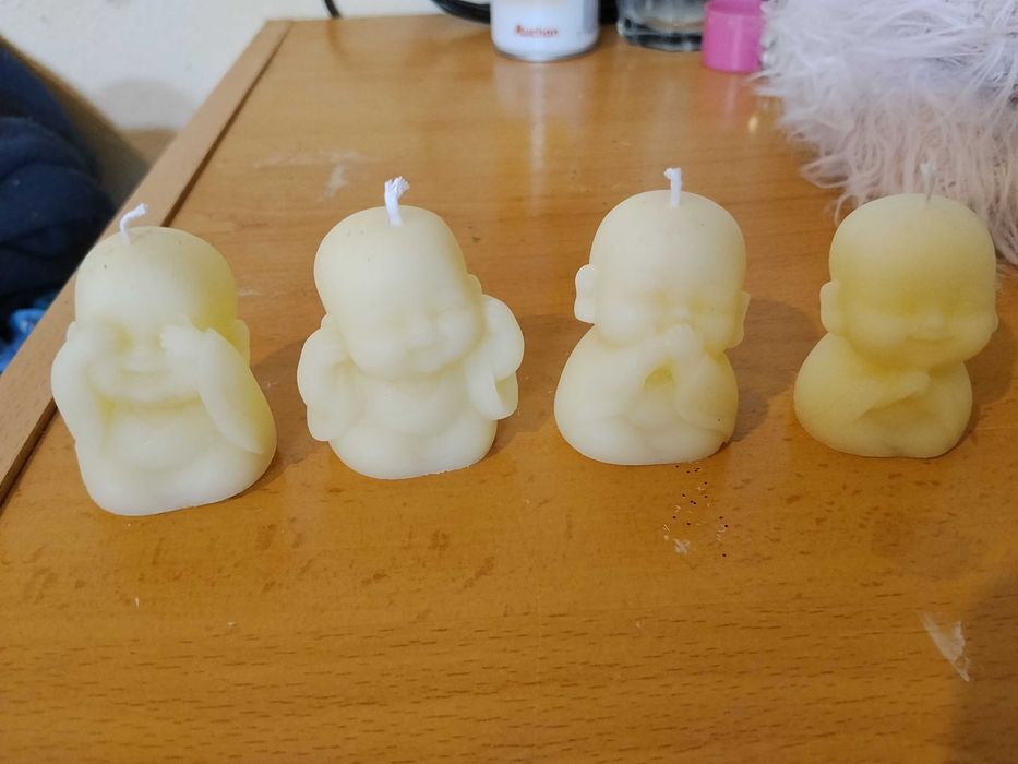 Budas em velas perfumadas