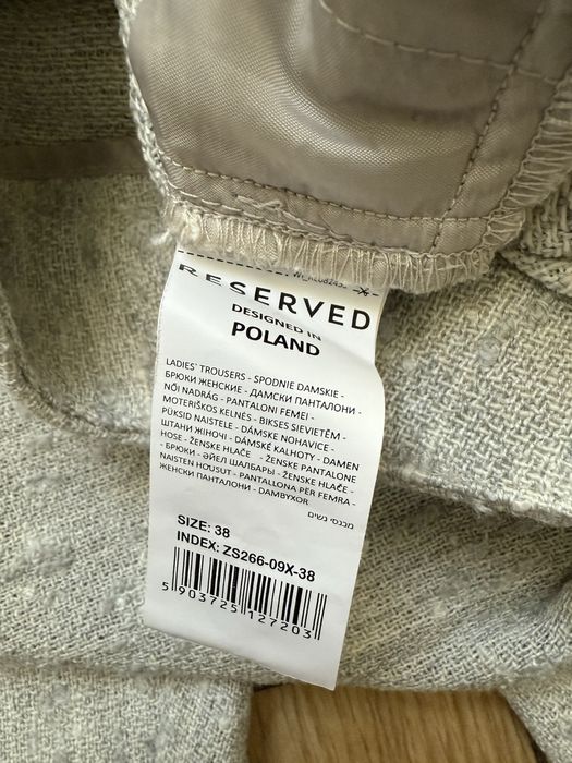 Jasnoszare spodnie Reserved 38