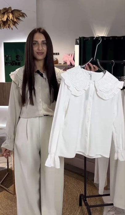 Біла блуза з комірцем