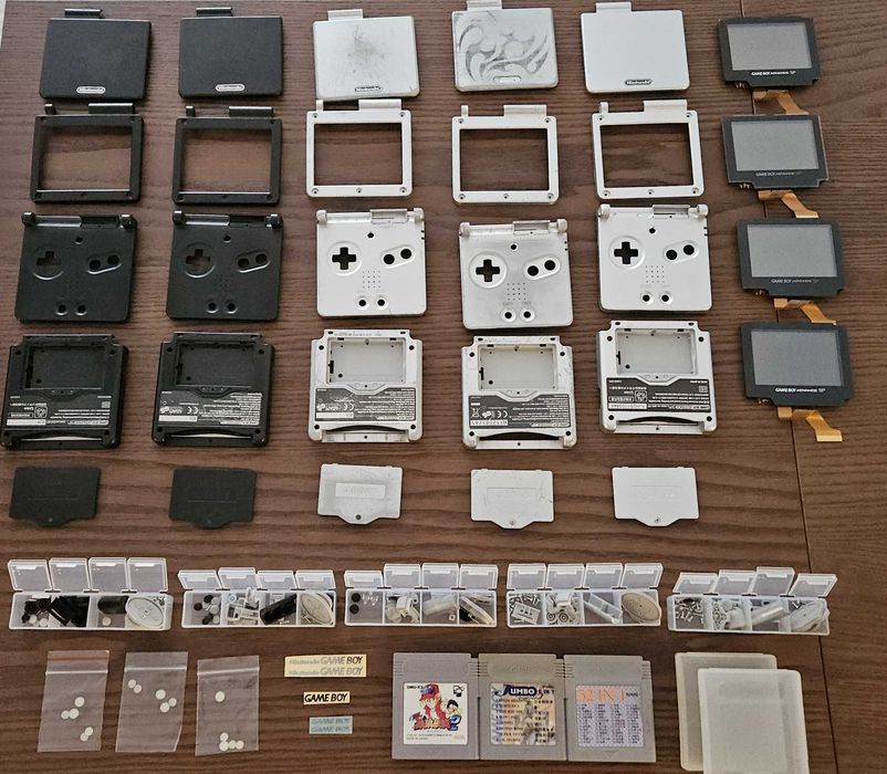 Pakiet - Obudowa OEM GameBoy Advance SP, śrubki, przyciski, zaślepki itp. - pozostałości po modach