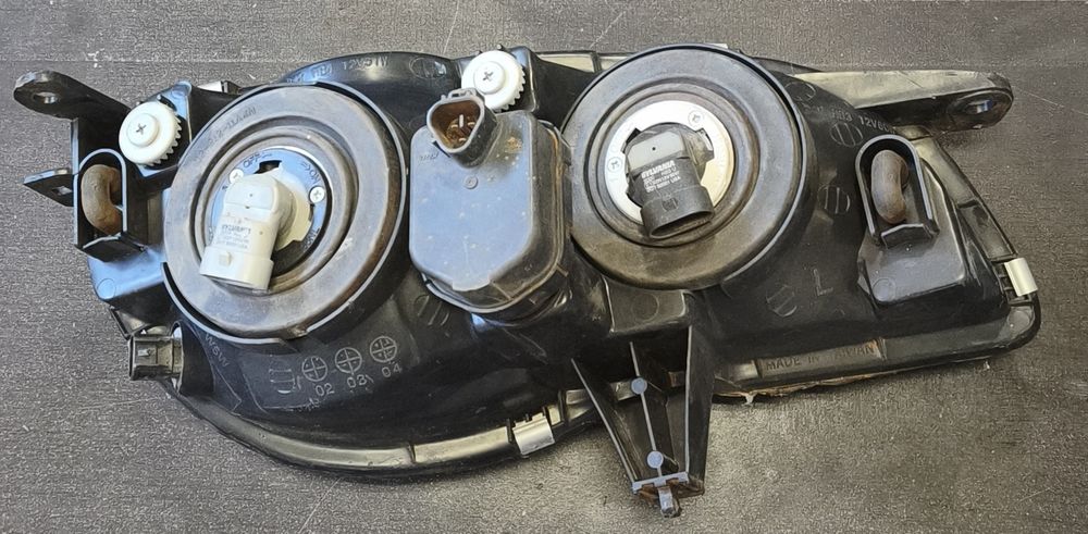 Farol Toyota Corolla ( E11) 1997-2002