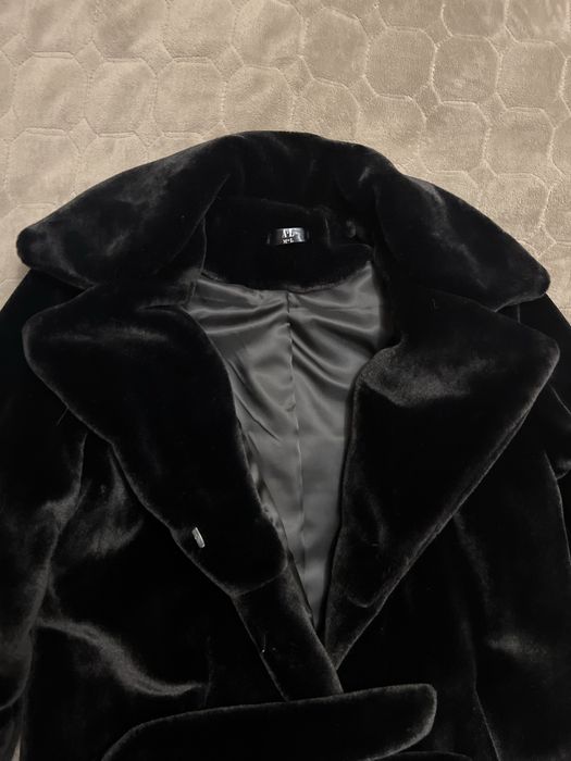 Шубка нова тепла