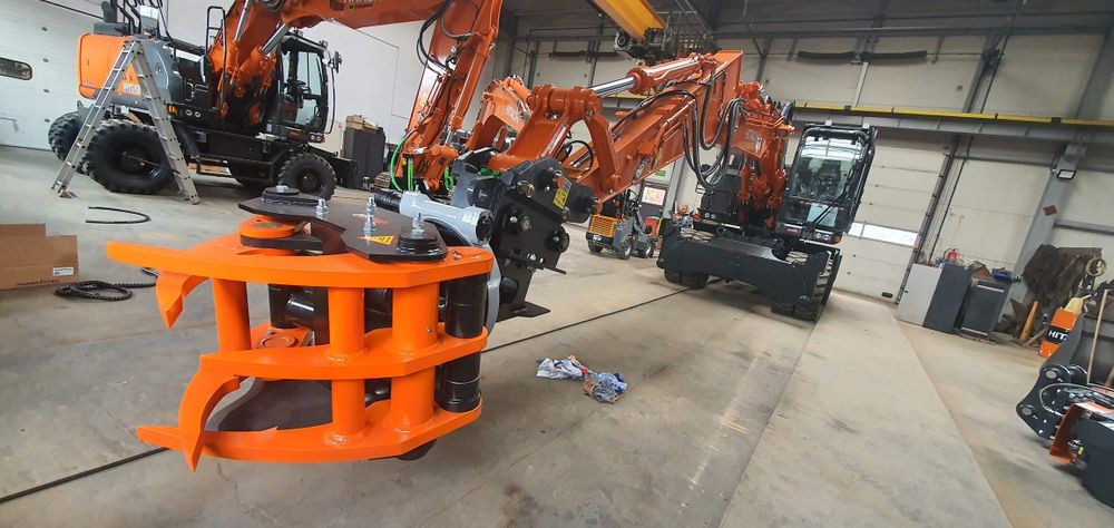 Głowica KXZ280 ścinkowa z rotatorem obrotnicą do koparki. Chwytak  hydrauliczny gilotyna ścina drzewa wycina krzaki  załadunek biomasse drewna gałęzi