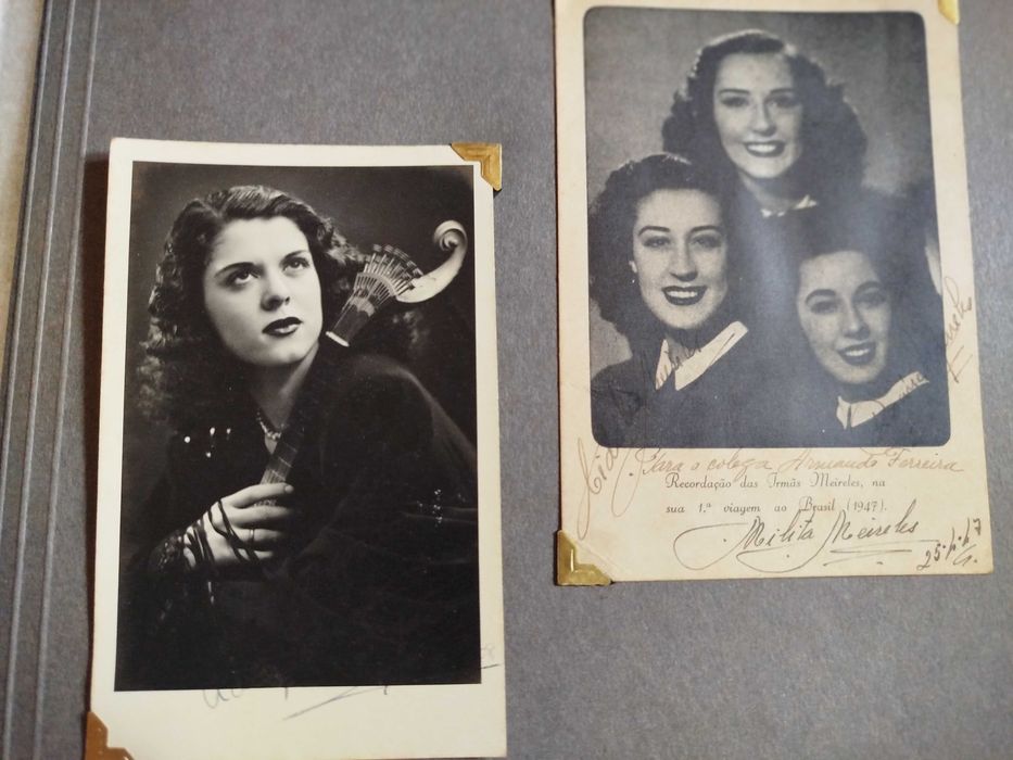 Álbum de fotos com dedicatória e assinaturas.