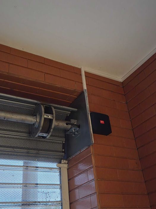 Automatismo de grade de loja