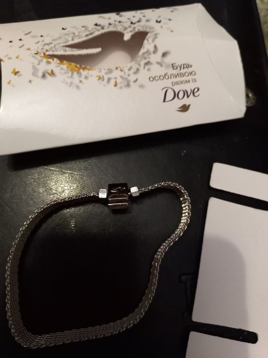 Фирменный браслет Dove  новый