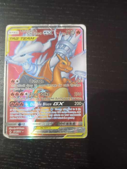 Carta de Pokémon Reagiram & Charizard