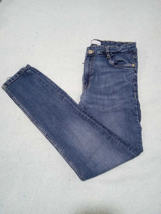 Calças de ganga para mulher