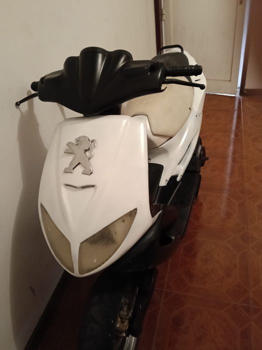 Vendo ou troco mota