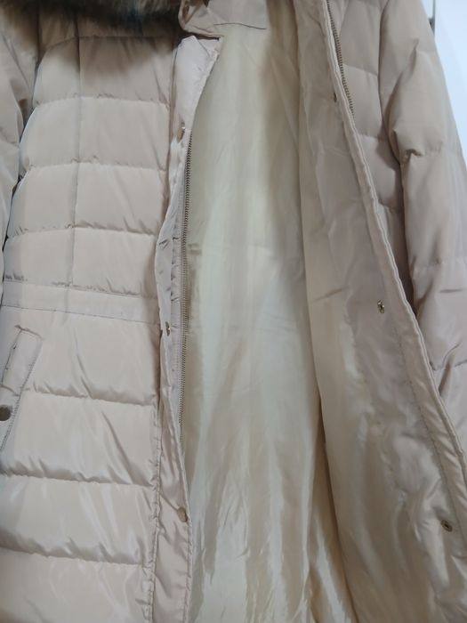 Продам женский зимний пуховик большого размера.