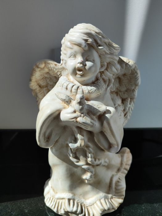 estatueta de anjo