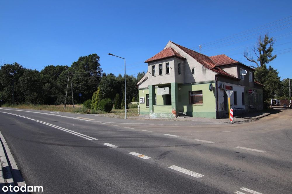 Duża działka z budynkiem handlowo - usługowym przy drodze wojewódzkiej