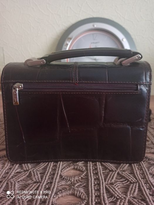 Чоловічі  барсетки  з натуральної шкіри