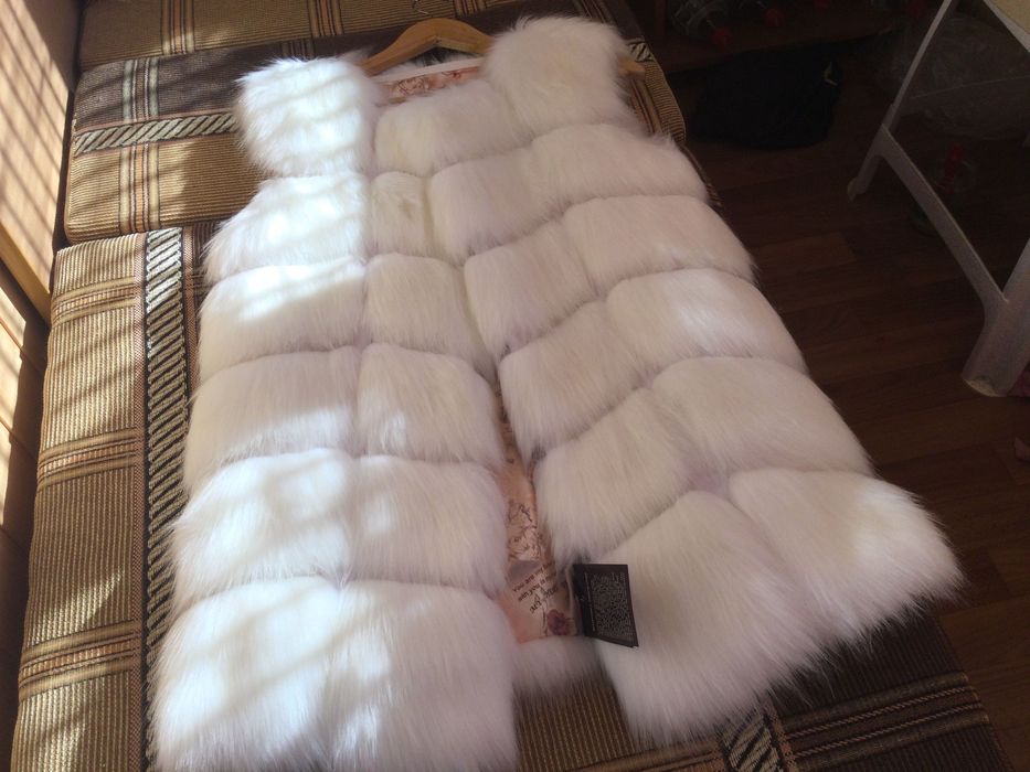 Женский меховой жилет