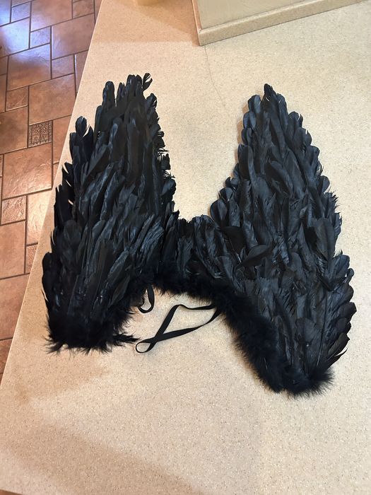 Черные крылья Ангела.