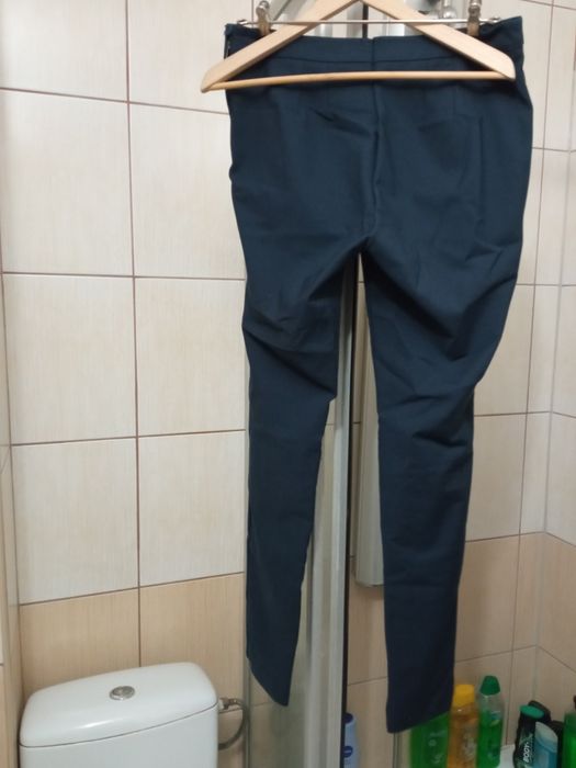 Spodnie damskie granatowe eleganckie M. Suwaki na dole nogawek