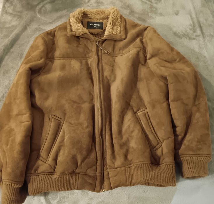 Casaco de pele (forrado com pelo)