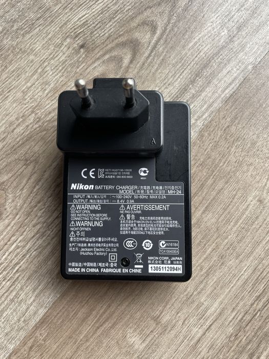 Set of Nikon D3200 photo camera with cable, charger, memory card, etc