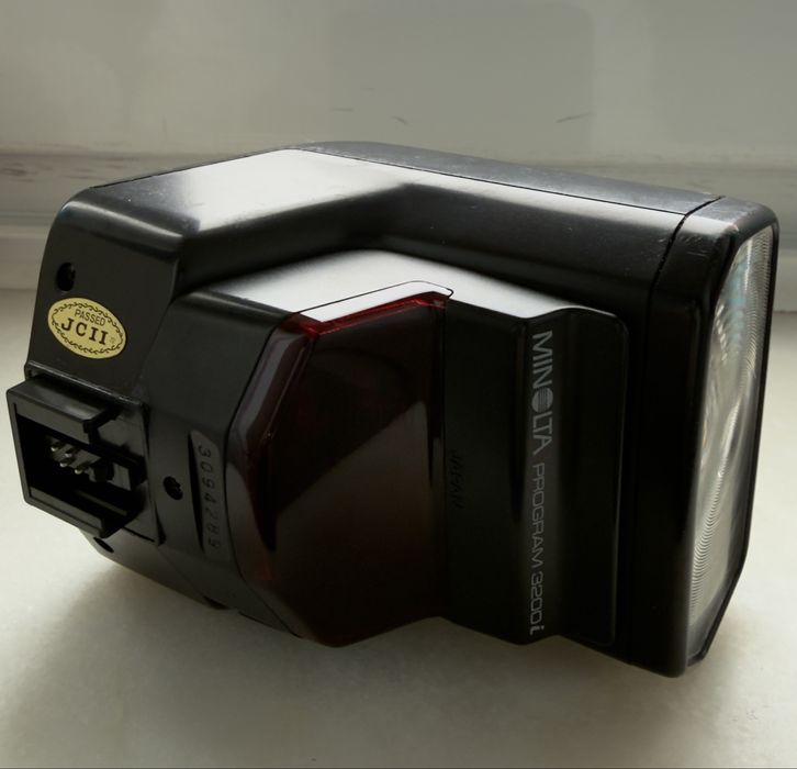 Conjunto Minolta Original – Objetiva 70–210mm + Flash Program 3200i