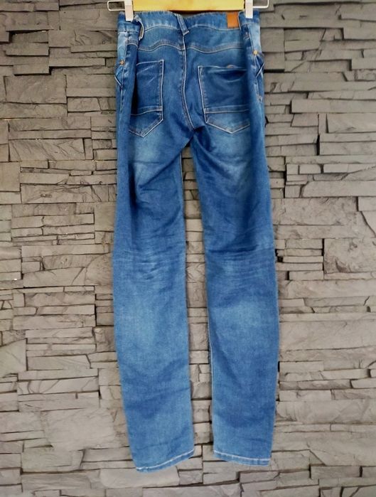 Damskie, niebieskie jeansy