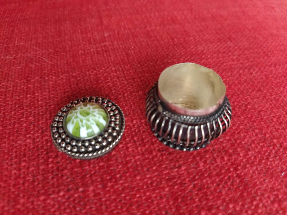 Exquisitely crafted box with original green stone shape
