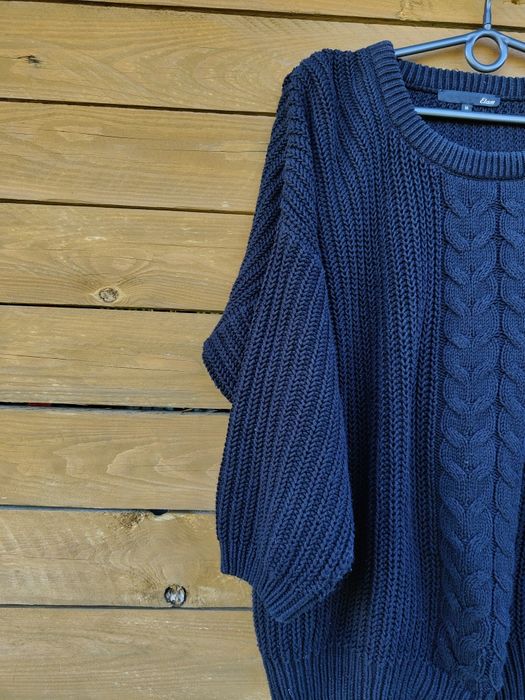 Sweter z warkoczem