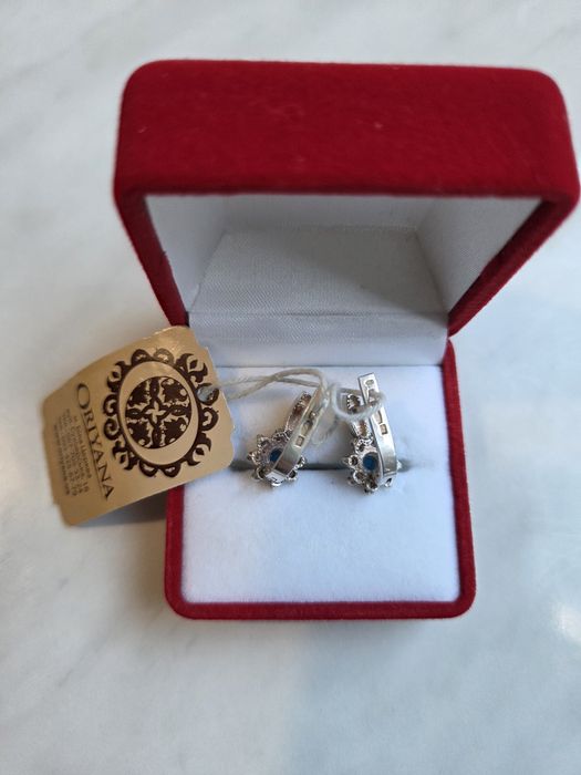 Срібні сережки с золотими пластинами.