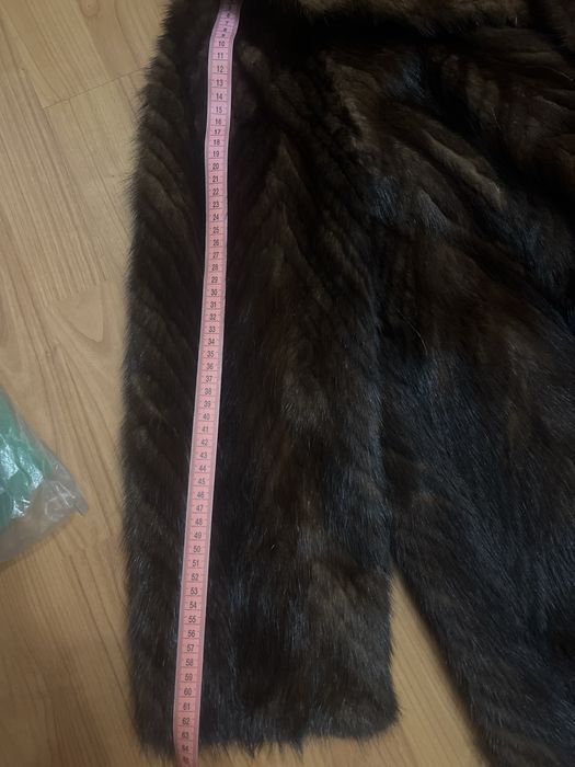 Норкова шуба шита полосами