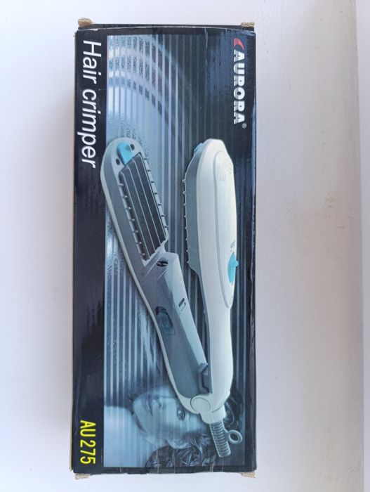 Плойка, утюжок, щипцы для волос.