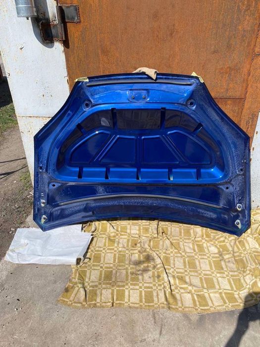 Tesla Model X капот - рест/до рест