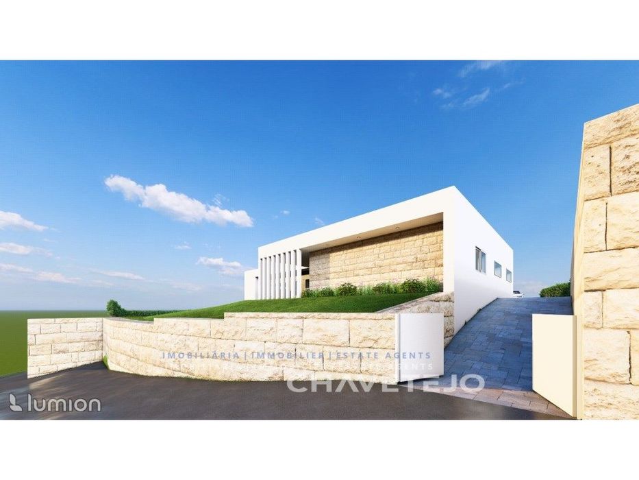 Terreno com projeto aprovado e licença de construção.