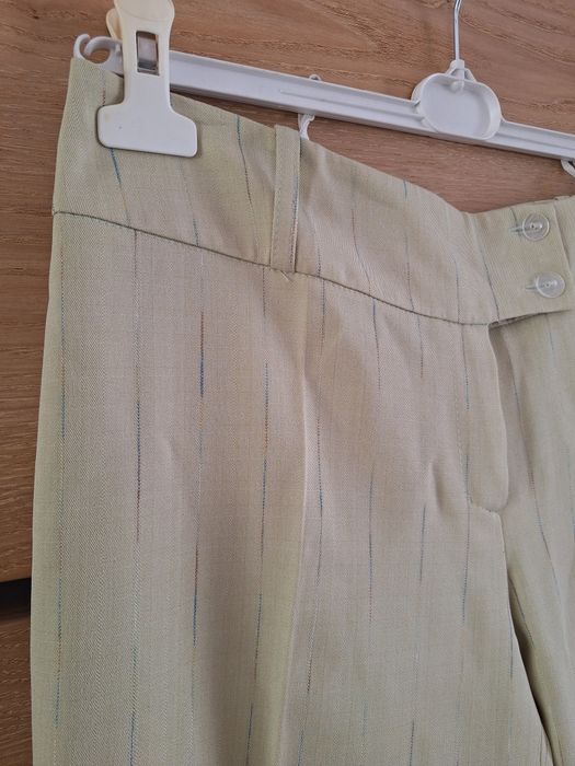 Eleganckie damskie spodnie garniturowe beżowe w paski 42 XL