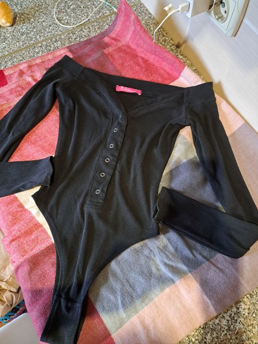 Жіноче боді в рупчик