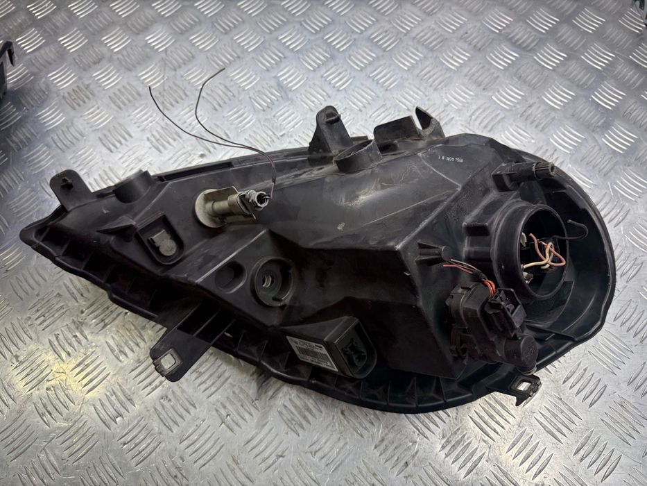 Фара левая  Renault Trafic Opel Vivaro  Primastar 2006- 8200701363